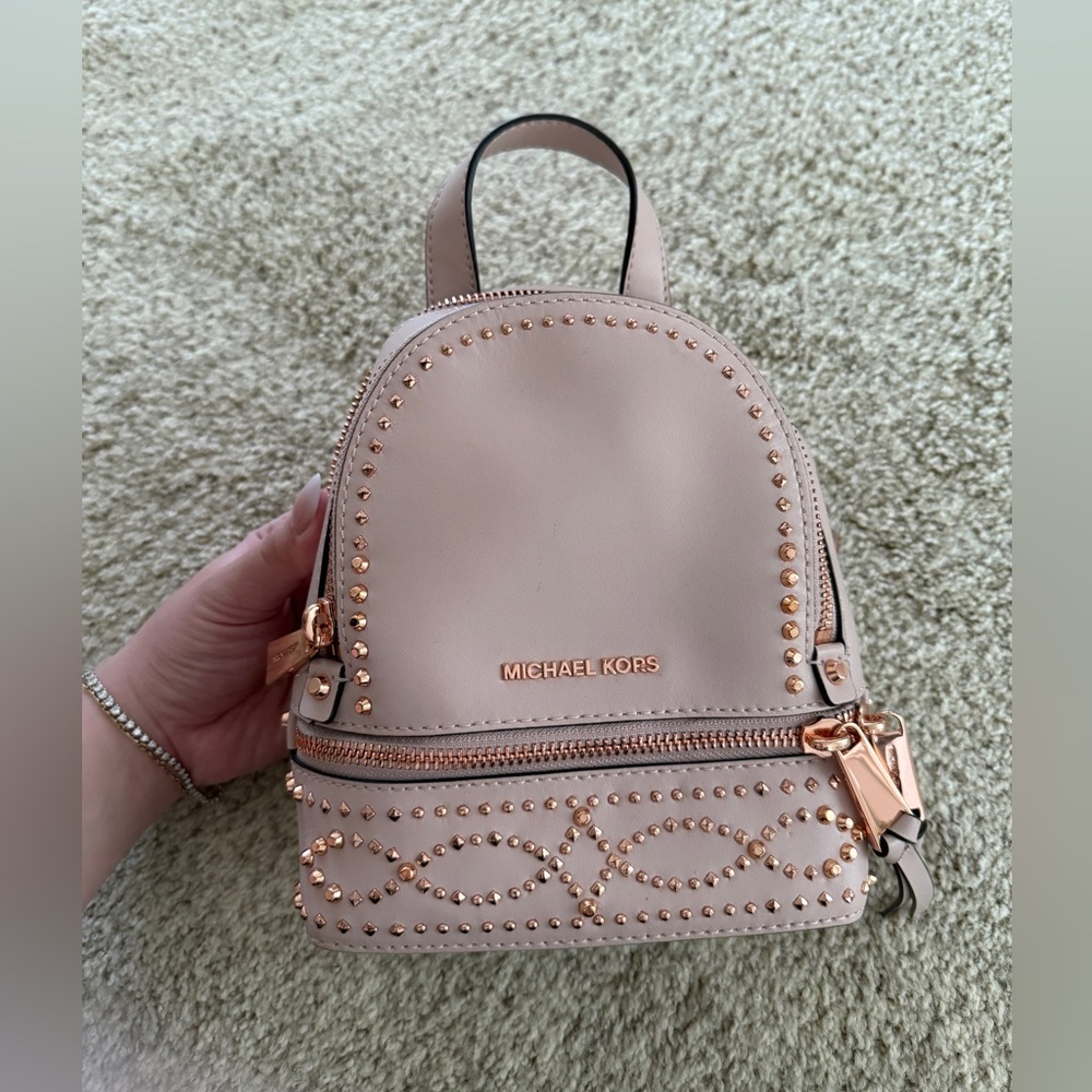 Michael Kors Pink Mini Backpack on Rose Gold